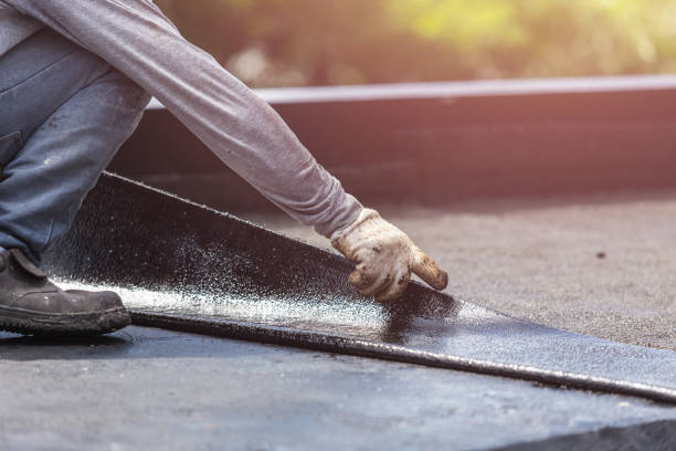 Professional Waterproofing technician working in Andrews, NC